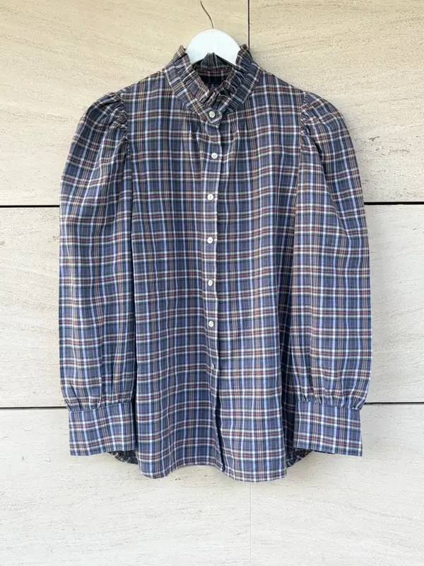 ANDION. Blusa algodón cuadros detalle volante