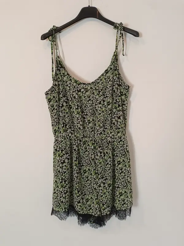 BCBG. Mono corto negro flores T.m