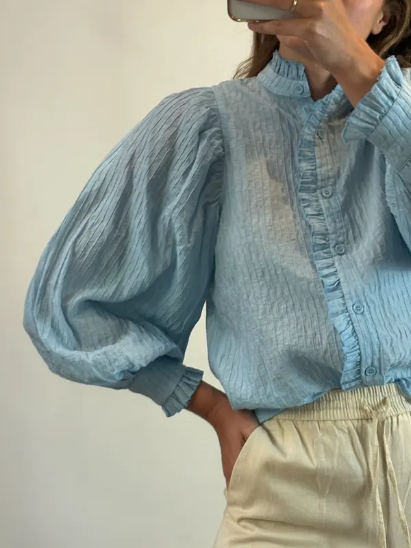 Blusa azul claro textura