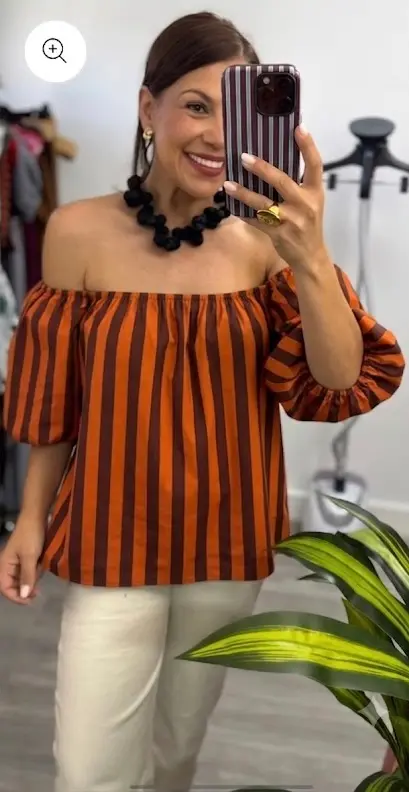 Blusa de rayas naranja