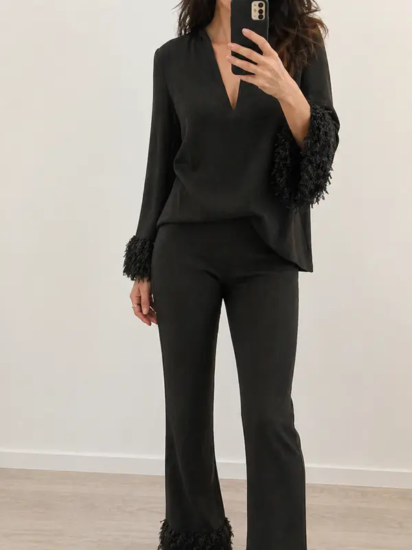 BOSSET. Total look negro flecos T.m