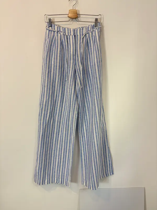 C&A. Pantalón pata ancha lino rayas