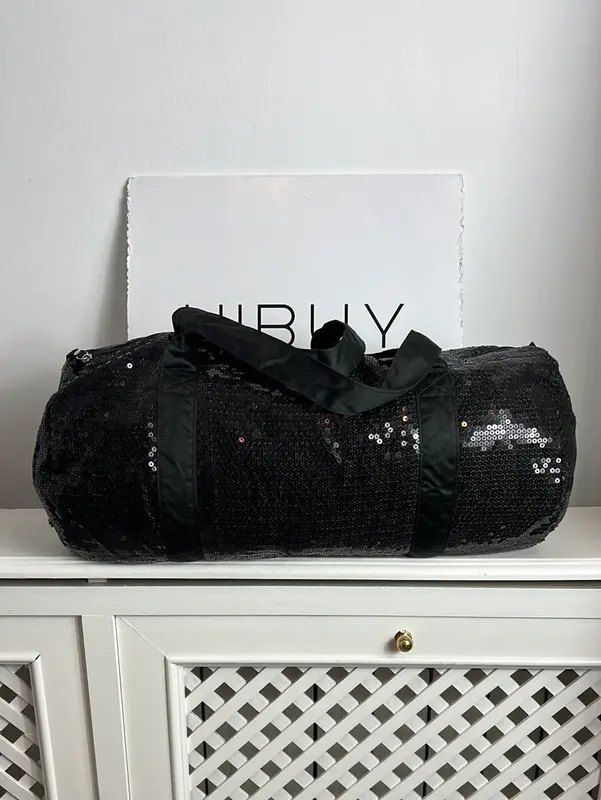 CALZEDONIA. Bolsa negra lentejuelas