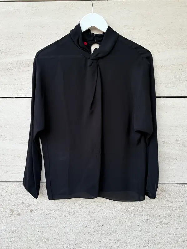 CAROLINA HERRERA. Blusa negra seda