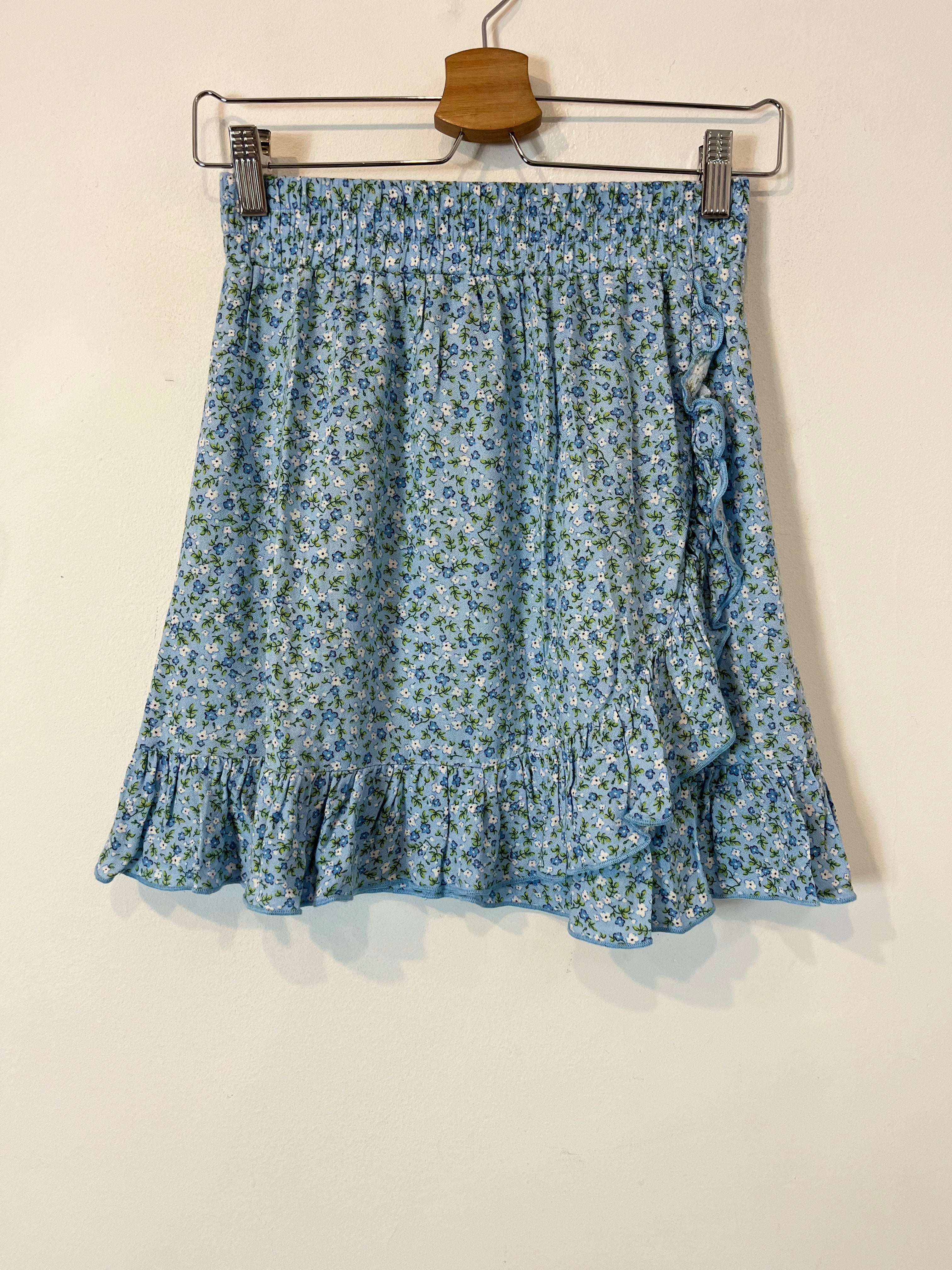 CLOCKHOUSE. Falda corta estampado flores. T. 36