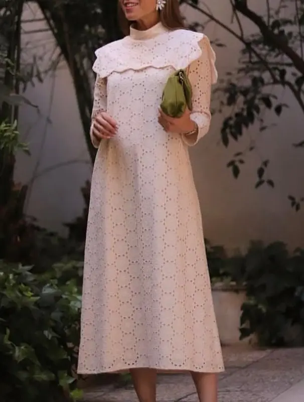 COOSY. Vestido midi rosa claro troquelado