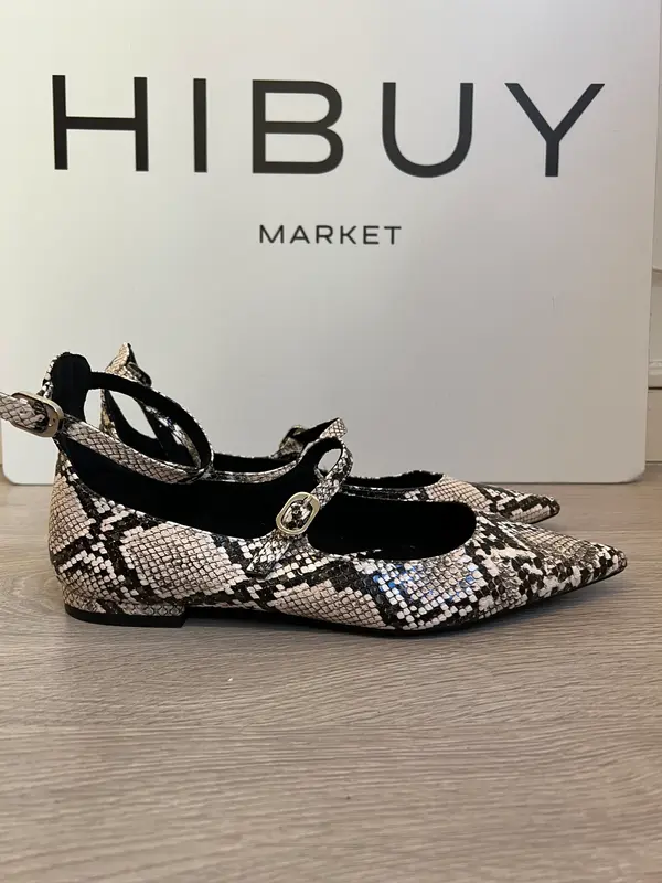 CORINA. Zapato plano animal print doble hebilla. T 38