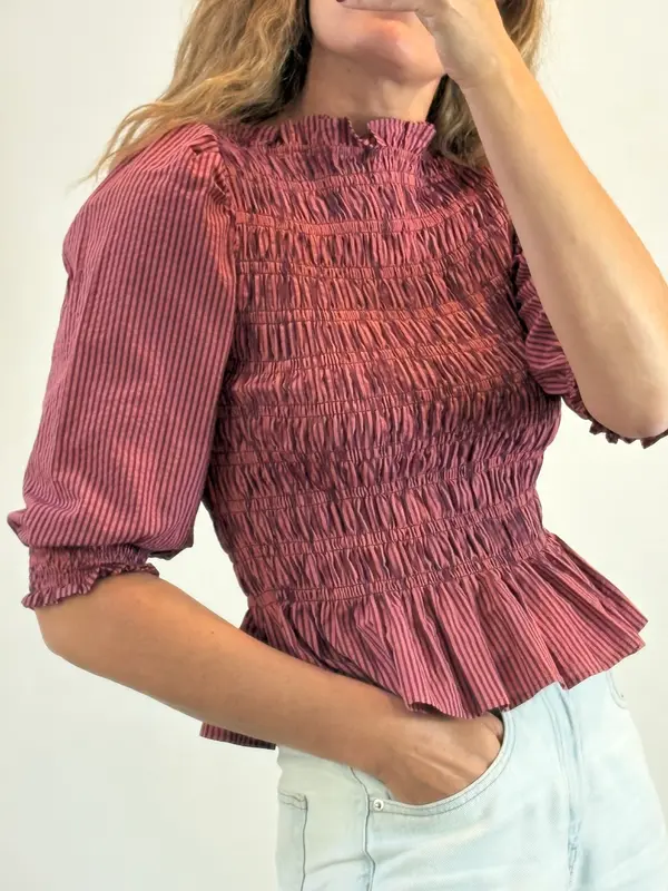 MAGNOLYA. Blusa rosa nido de abeja