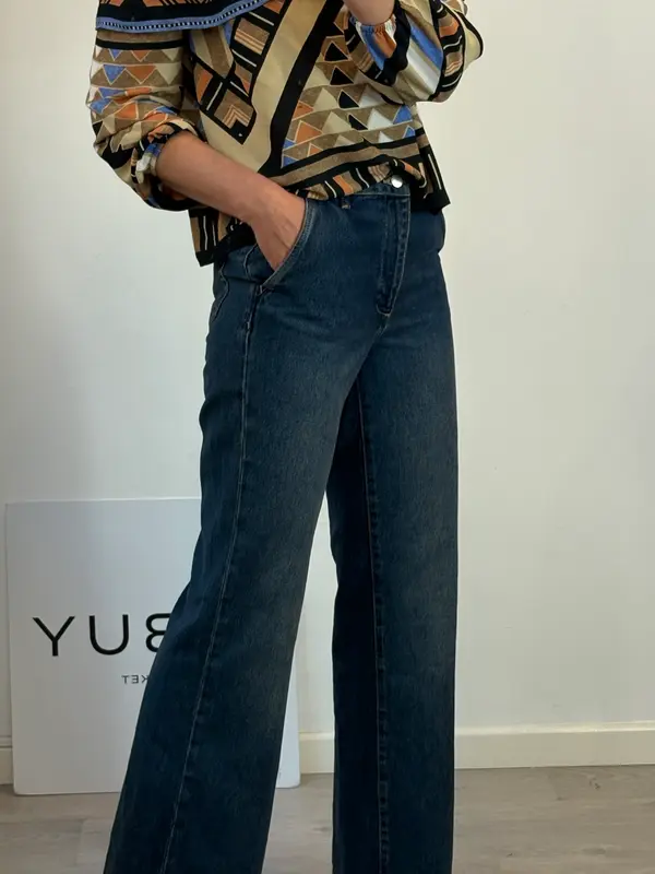 MANGO. Denim pata ancha tiro medio