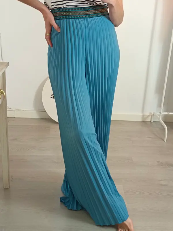 OKY COKY. Pantalón azul plisado  T.38