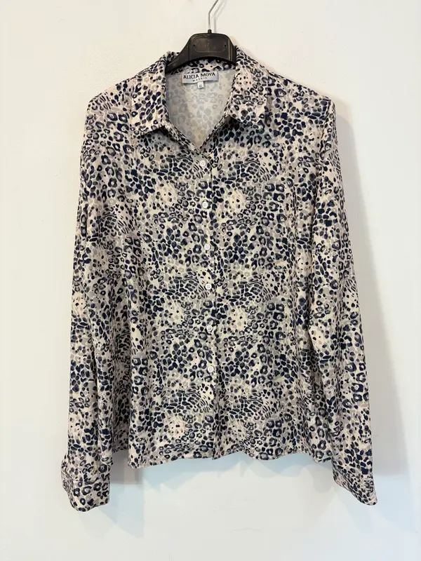 OTRAS. Blusa textura estampada