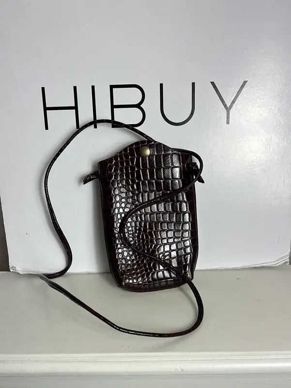 OTRAS. Bolso mini piel troquelada