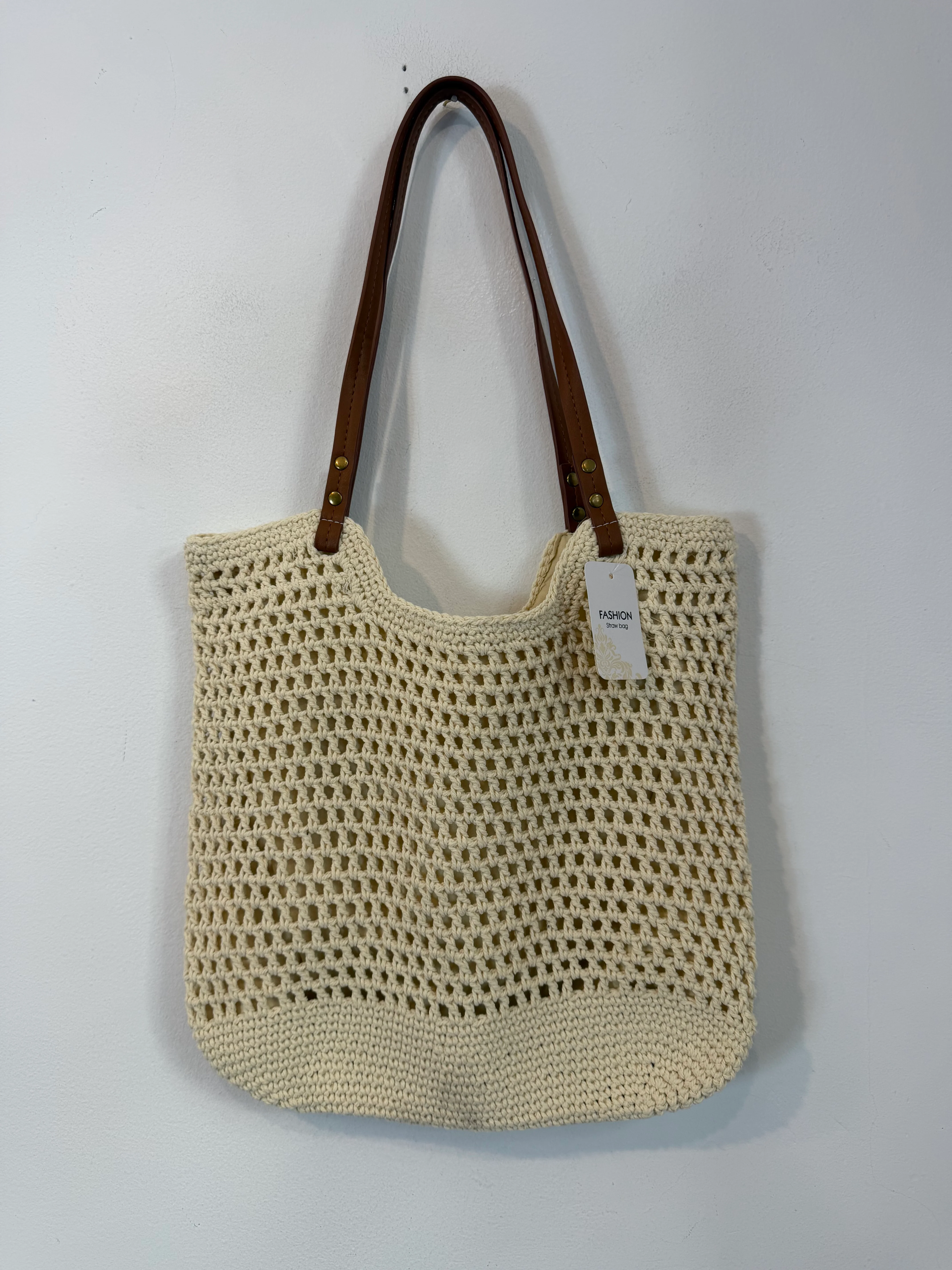 OTRAS. Bolso tote de croché asas marrones