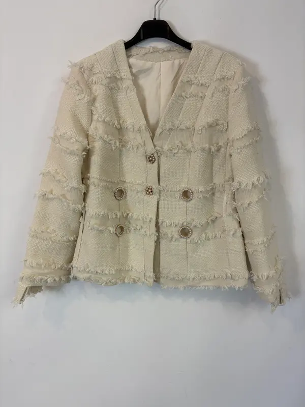 OTRAS. Chaqueta tweed detalles perla. T S