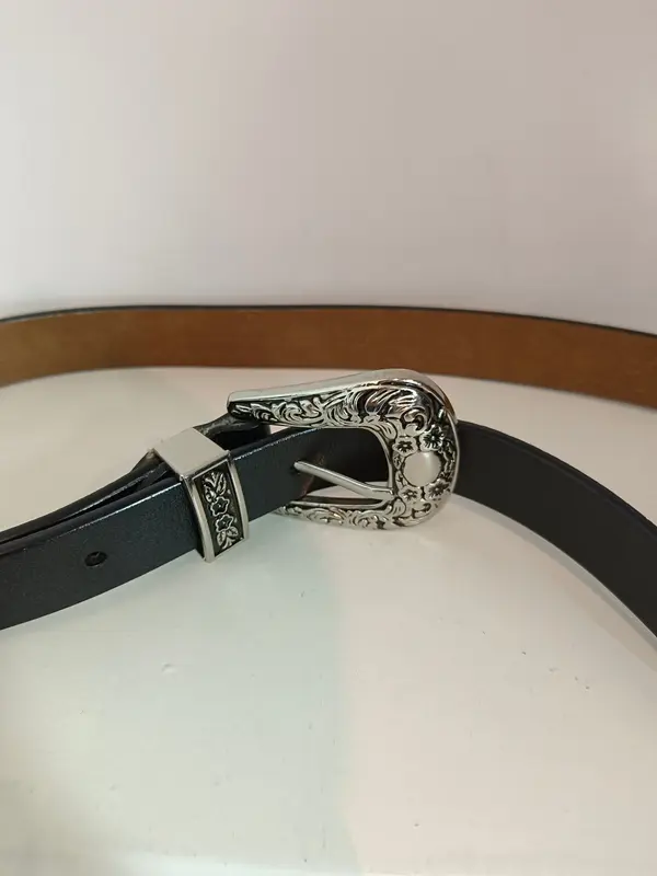 OTRAS. Cinturón negro hebilla