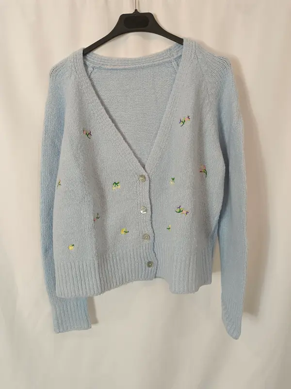 OTRAS.Jersey abotonado bordados T.l