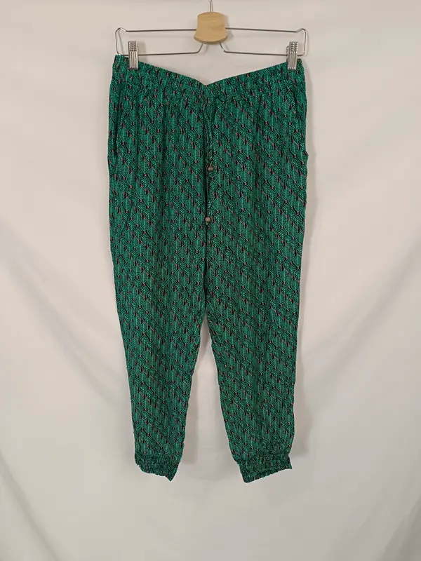 OTRAS. Pantalón fluido negro estampado Tu(s/m)