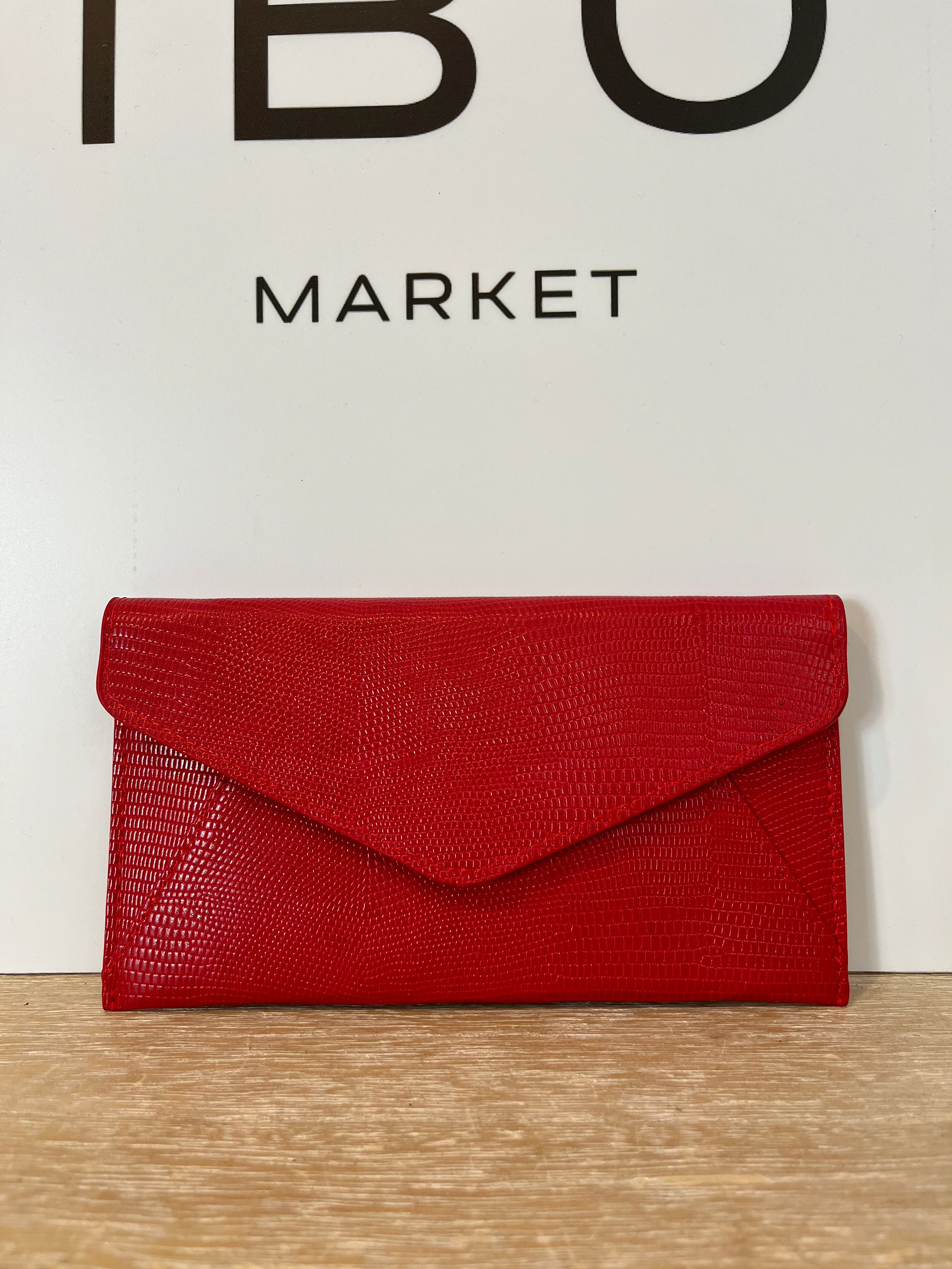 REDONDO BRAND. Cartera roja textura