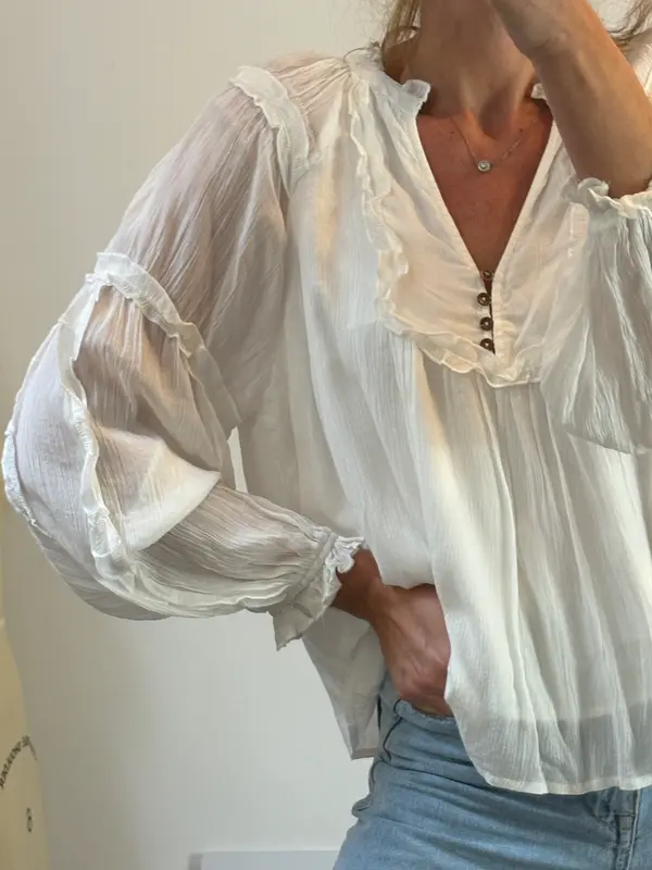 SFERA. Blusa blanca fluida