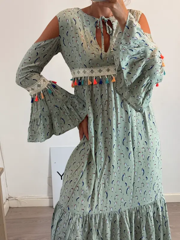 STRENA.vestido verde aberturas T.s