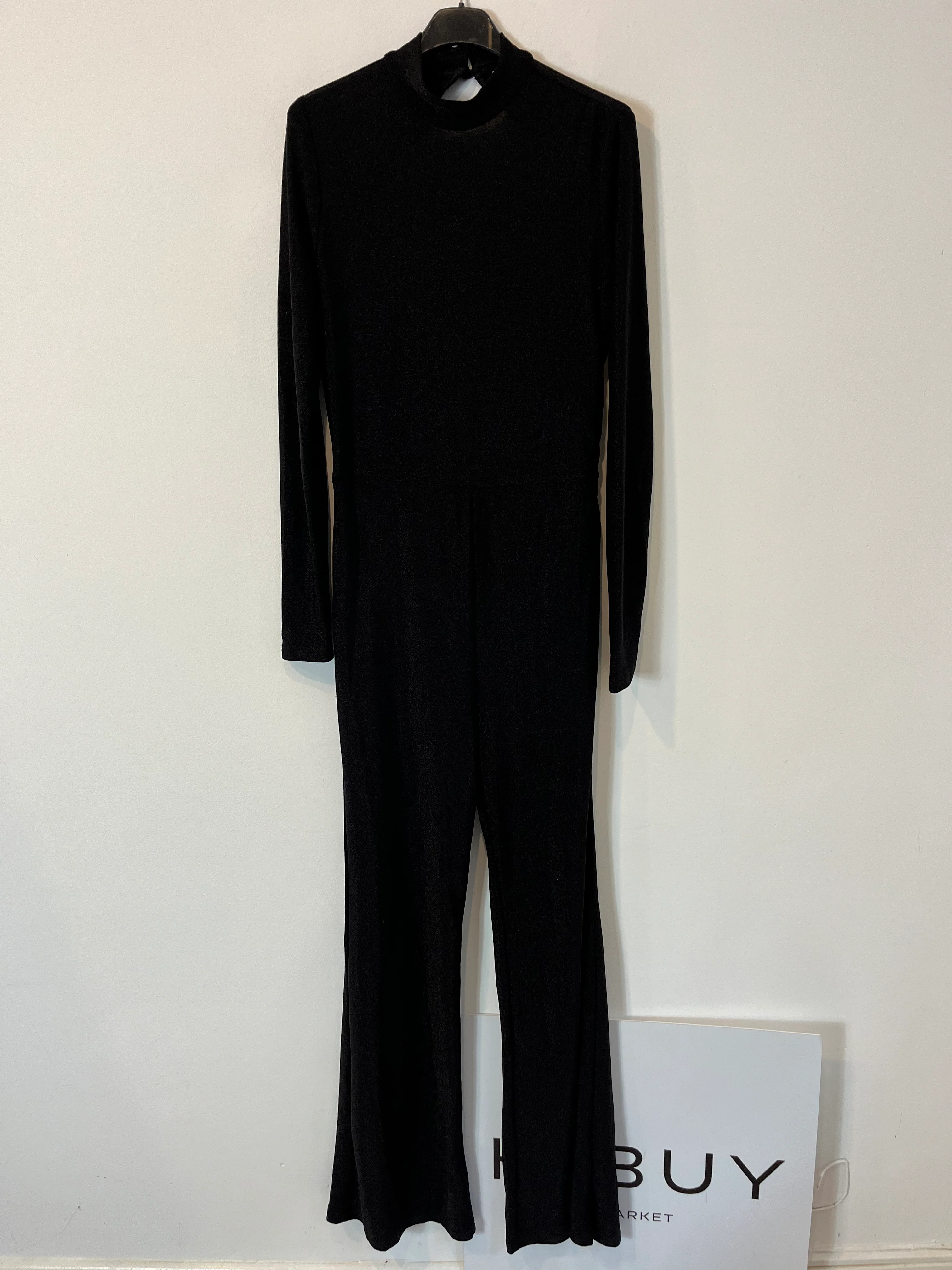 SUPERDOWN. Mono negro purpurina T.l