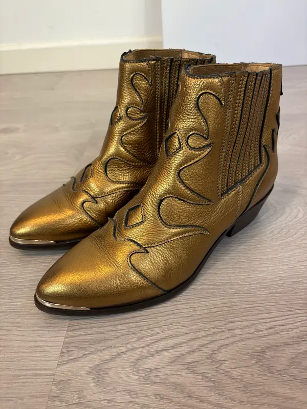 TORAL. Botines dorados piel