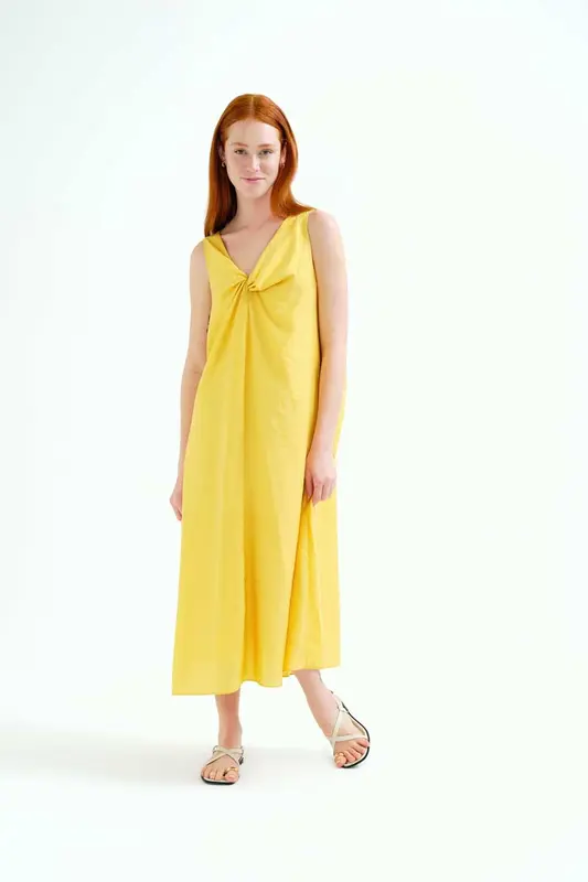 VESTIDO LARGO AMARILLO CON NUDO ESCOTE