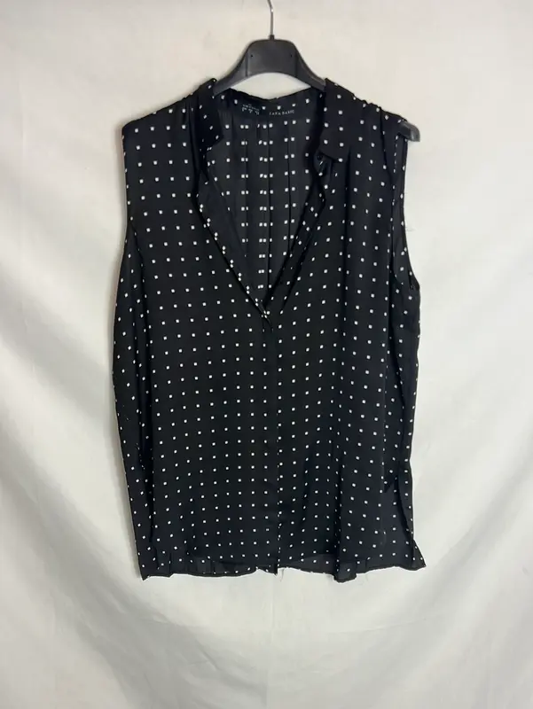 ZARA. Blusa sin mangas negra y blanca. T L