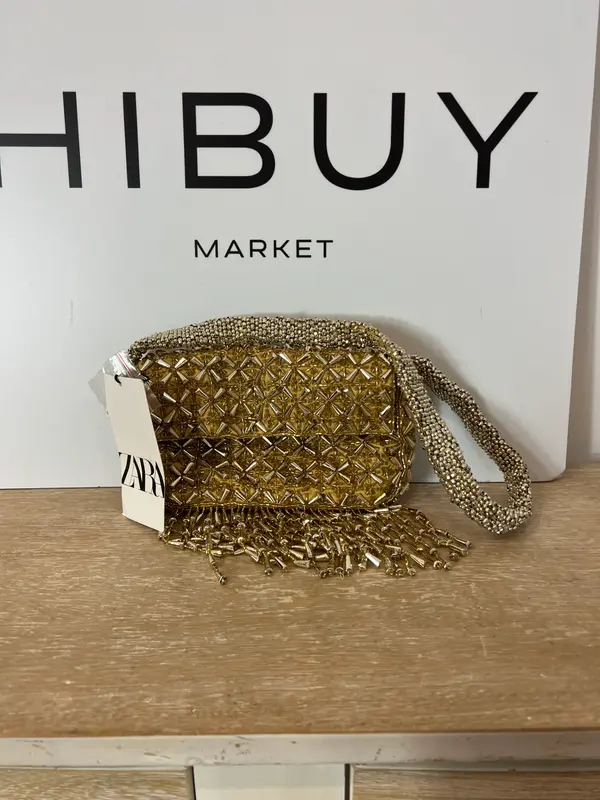 ZARA. Bolso mini abalorios dorados