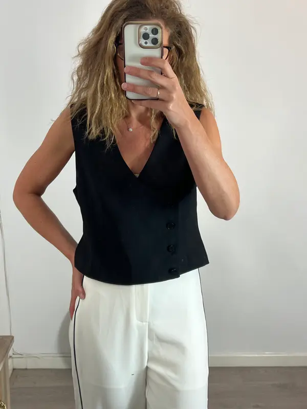 ZARA. Chaleco negro cruzado T.xl