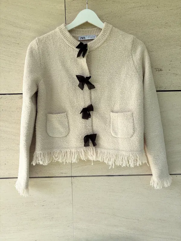 ZARA. Chaqueta punto lazos. T S