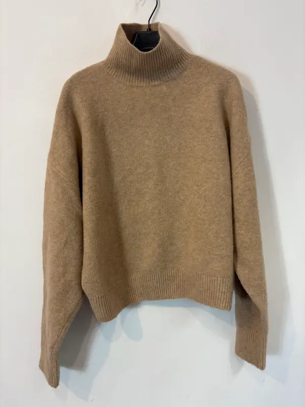 ZARA. Jersey beige jaspeado cuello alto