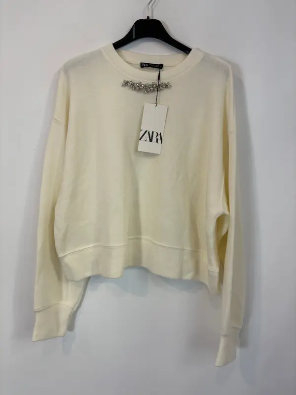 ZARA. Jersey color crudo detalle escote. T S