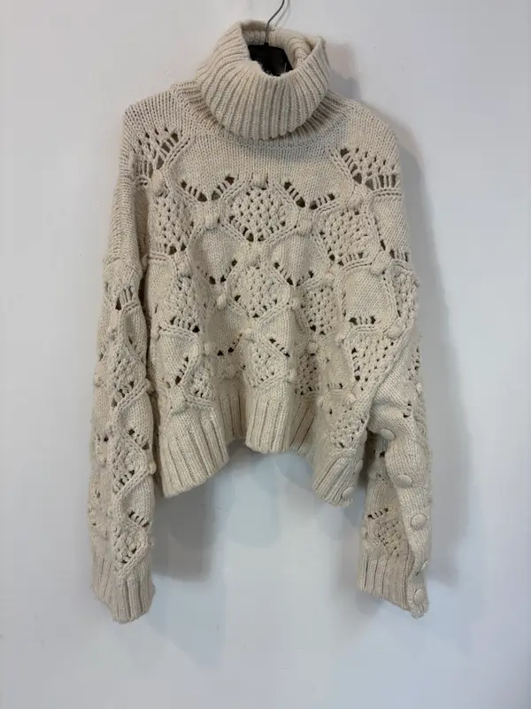 ZARA. Jersey crudo borlas
