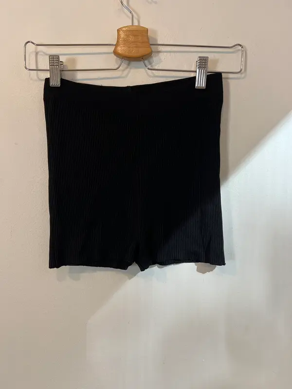 ZARA. Pantalón entallado negro canalé T.s